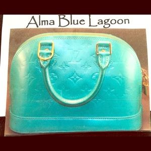 LOUIS VUITTON HANDBAG ALMA BB MONOGRAM VERNIS